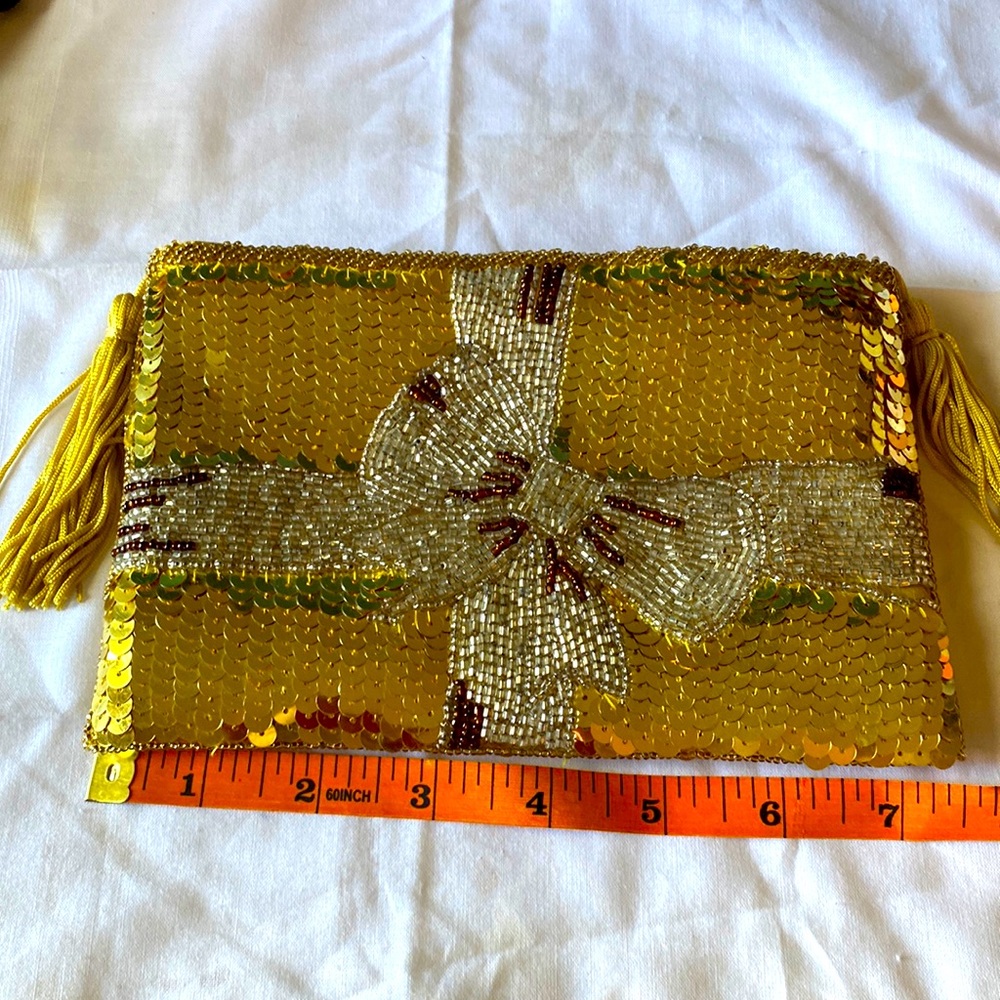 Unbranded sequined clutch
